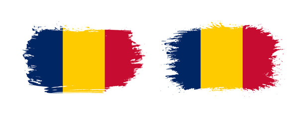 Set of two grunge brush flag of Chad on solid background