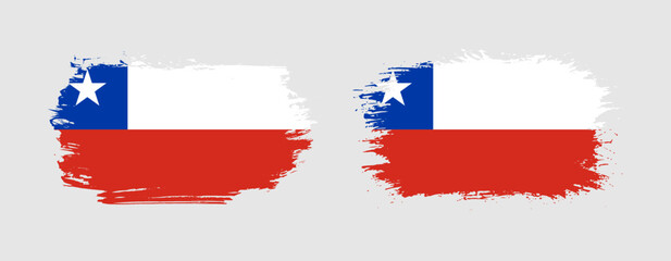 Set of two grunge brush flag of Chile on solid background