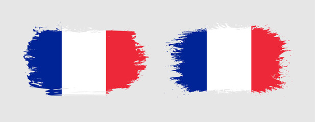 Set of two grunge brush flag of France on solid background