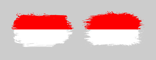 Set of two grunge brush flag of Indonesia on solid background