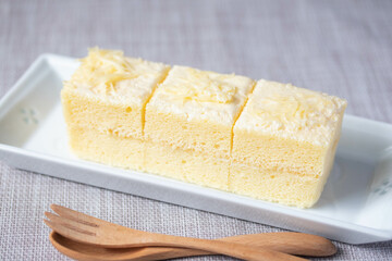 Vanilla cream cake in white plate