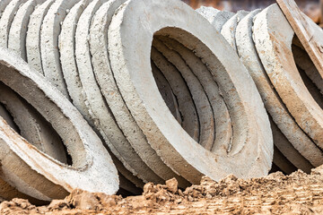 Reinforced concrete rings for the installation of underground wells at the construction site. Reinforced concrete products for the device of underground communications. Sewerage and plumbing.