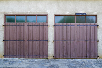 gate home portal garage double door house windows facade