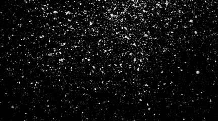 Falling snow isolated on black background Overlay texture Snowstorm