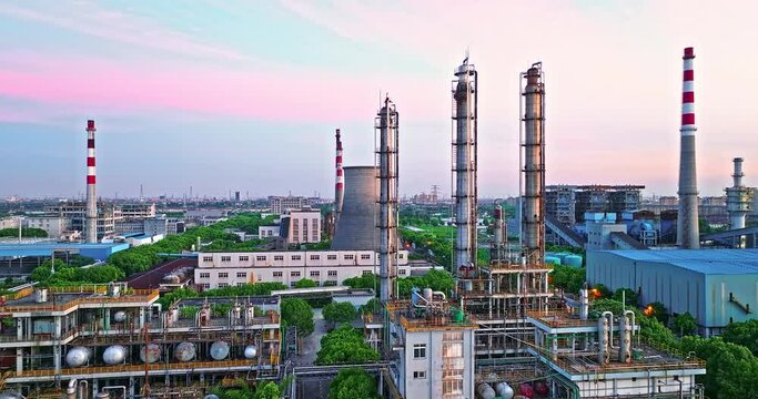 Aerial view of chimneys of power plant, an industrial district. Modern large thermal power plant. Generation through coal switched over to natural gas.