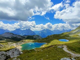 Fototapeta na wymiar Lakes Olbe on a cloudy day in Sappada on the mountains of Dolomites, Italy