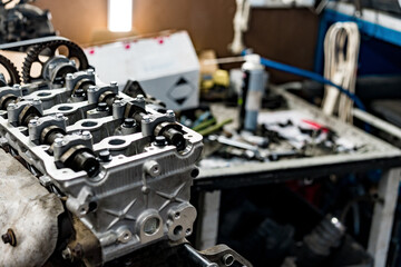 Disassembled car engine block at car service station