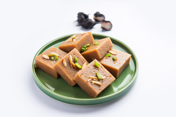 Singhara Barfi or Singhada burfi or halwa made using water chestnut flour, fasting or upwas food