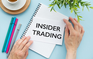 INSIDER TRADING text on sticker on diagram background