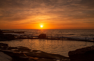 Sunrise over rock pool Maroubra