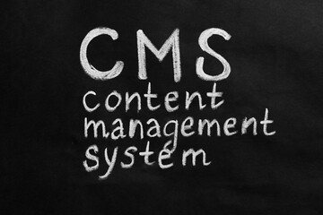Abbreviation CMS (Content Management System) on black background