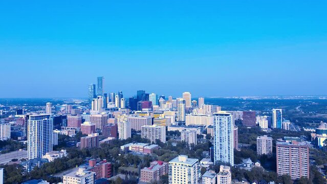3-3 Edmonton Downtown Summer flyover residential towers schools hotels government buildings condominiums surrounded by lush green parks on a clear day