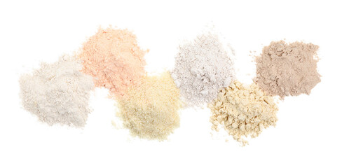 Different types of flours on white background, top view