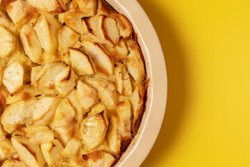Freshly baked clafoutis pie with apples. Apple pie. Top view.