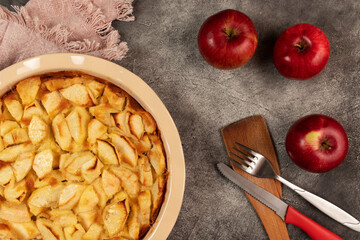 Freshly baked clafoutis pie with apples. Apple pie. Top view.