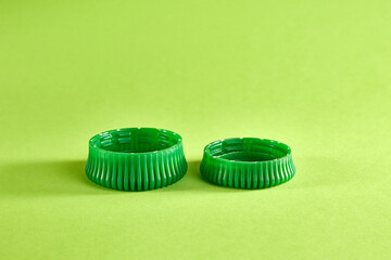 Plastic lids for larger and smaller water bottles. Reducing the use of plastic to save the...