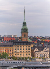 Fototapeta na wymiar Apartment, offices and the German Church in the old town Gamla Stan an autumn day in Stockholm