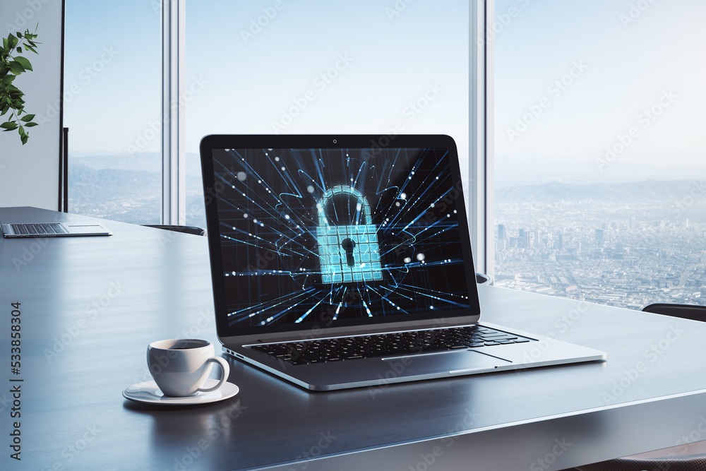 Poster close up of office workplace with laptop and abstract glowing padlock on screen, blurry city view ba