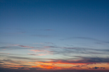 Orange sunset sky on the horizon