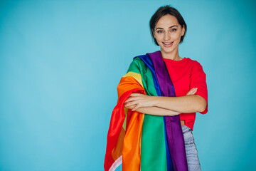 Woman waving lgbt colorful flag for equal right