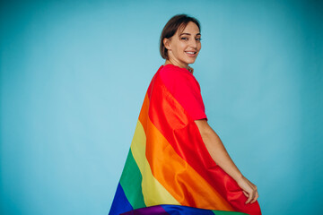 Woman waving lgbt colorful flag for equal right