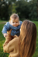 mother and son in the park first steps