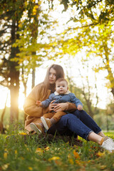mother and son in the park first steps
