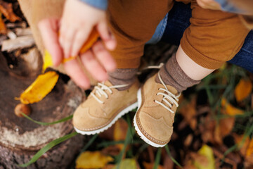 mother and son in the park first steps