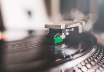 Fototapeta na wymiar close-up of a vinyl record player - Music festival 21 june