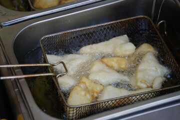 Roasting of a traditional Kazakh dough dish - baursak.