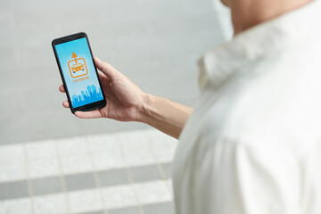 Man Checking Car Sharing Application