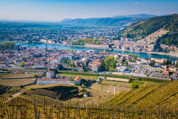 View on the Chapoutier's vineyards of Tain l'Hermitage, with the city and the Rhone river valley ...