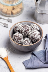 Coconut chocolate balls. Candy. Dessert. Vegetarian food.