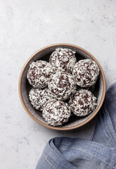Coconut chocolate balls. Candy. Dessert. Vegetarian food.