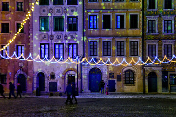 old market square decorated with lights for Christmas, Unesco World Heritage Site, old town of...