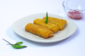 Indonesia food (risoles) on white background with sauce