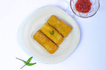 Indonesia food (risoles) on white background with sauce