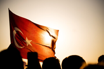 Close up shot of a Turkish flag on sunset.