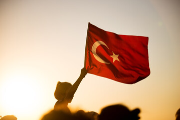 Close up shot of a Turkish flag on sunset.