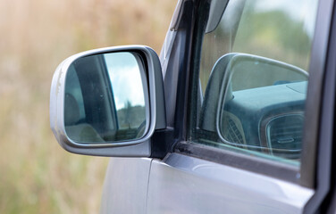 Mirror on the car door.