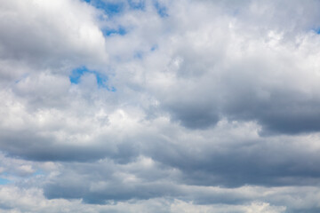 White clouds against the blue sky.