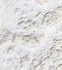 Obraz na płótnie Canvas White volcanic limestone rock as background.