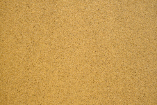 Golden sand at the beach of Mylopotas in Ios Greece