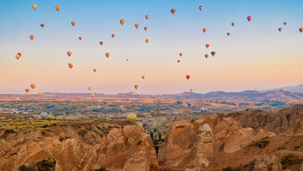 Sunrise with hot air balloons in Cappadocia, Turkey balloons in Cappadocia Goreme Kapadokya, and...