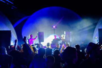 Fototapeta na wymiar Male DJ mixing music in nightclub