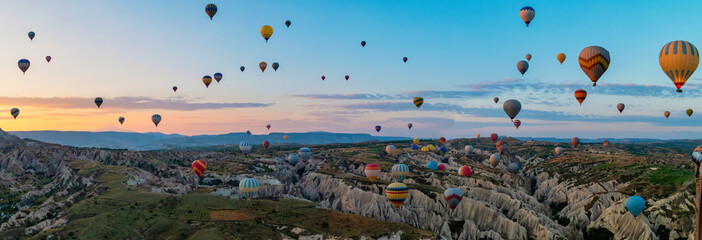 Sunrise with hot air balloons in Cappadocia, Turkey balloons in Cappadocia Goreme Kapadokya, and...