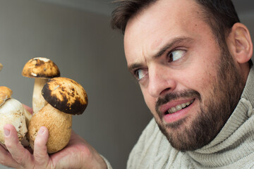 boletus mushroom in a bearded man © vandame
