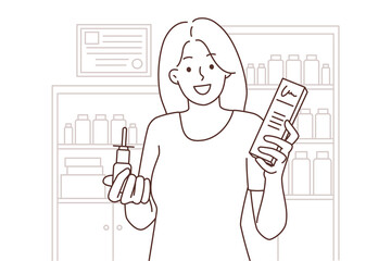 Smiling woman with meds in drugstore 