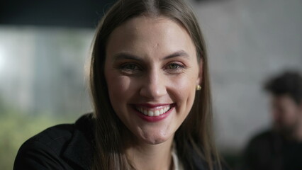 Portrait of a positive young woman smiling at camera. closeup person face. Happy girl in her 20s