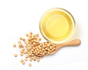 Top view of Soybean oil in glass bowl with seeds isolated on white background.